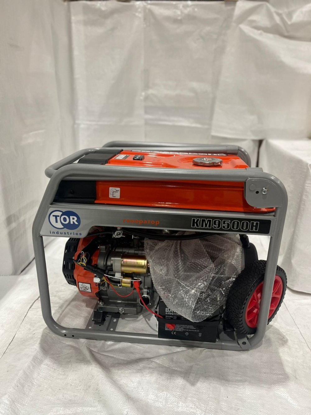 Генератор бензиновый 7,0 кВт 220В с АВР, электростартером и колесами TOR KM9500HA