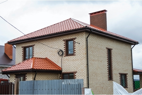 Металлочерепица камея 0,5 Satin RAL 8004 терракота