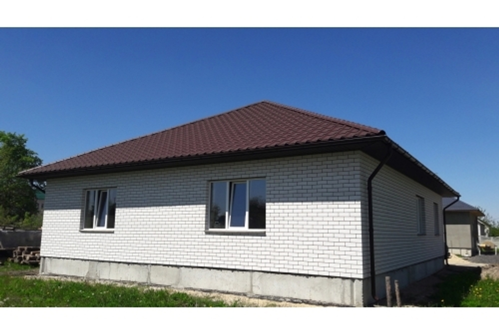 Металлочерепица камея 0,5 Rooftop Бархат RAL 8017 шоколад
