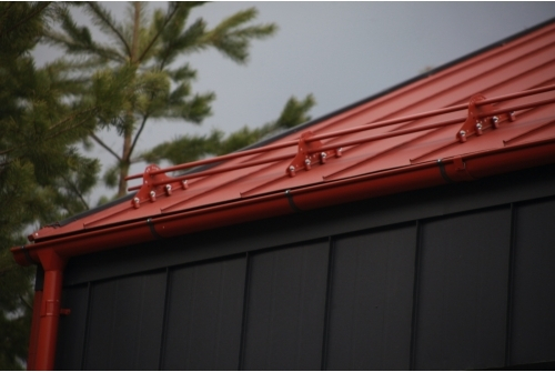 Фальц двойной стоячий Grand Line 0,5 Satin Matt с пленкой на замках RAL 8004 терракота