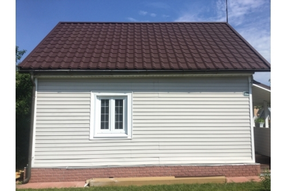 Металлочерепица камея 0,5 Rooftop Бархат RAL 8017 шоколад